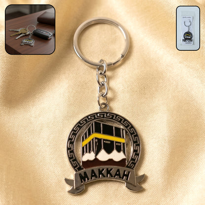 Wukusy premium Makkah design metal keychain with round pendant, featuring intricate Islamic artwork and durable metal construction.