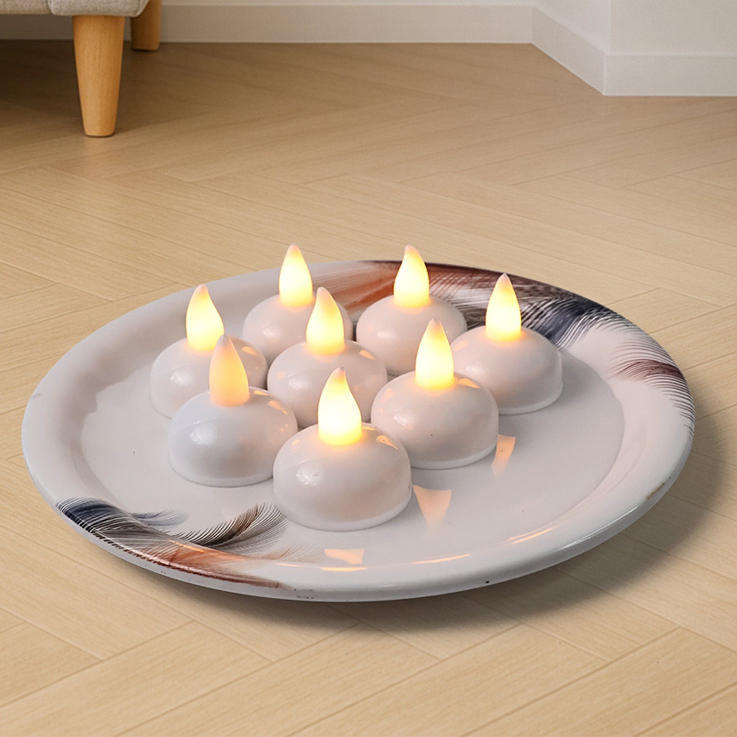 Set of four Wukusy round LED flameless tealight candles for home decor, featuring realistic flickering light and warm glow.