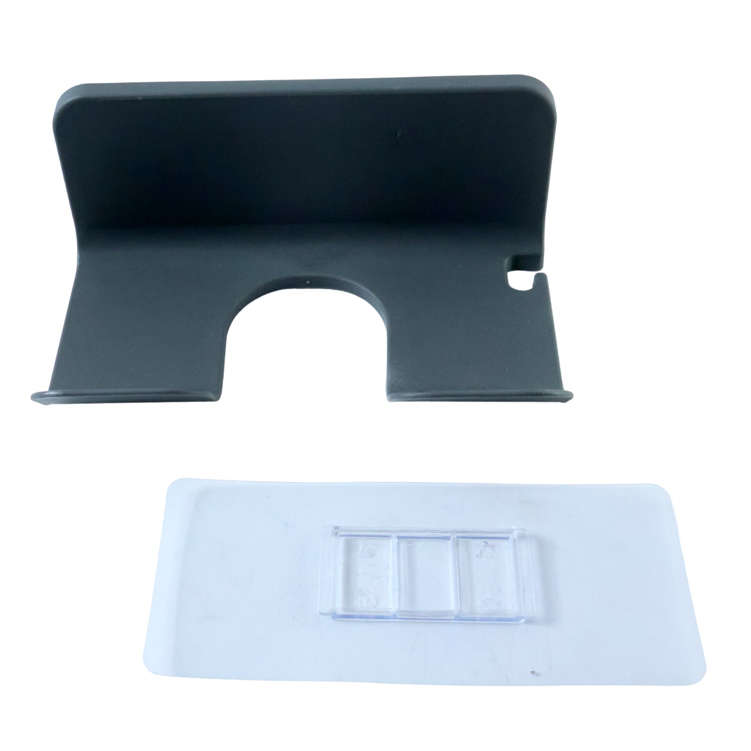 Wall-mounted Wukusy hair dryer holder showing a sleek, black plastic design with a mounting bracket for organized storage.