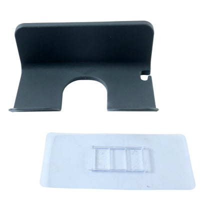 Wall-mounted Wukusy hair dryer holder showing a sleek, black plastic design with a mounting bracket for organized storage.