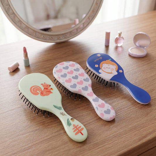 Colorful mix design kids hair comb by Wukusy with vibrant, playful patterns and durable plastic teeth for gentle hair styling.
