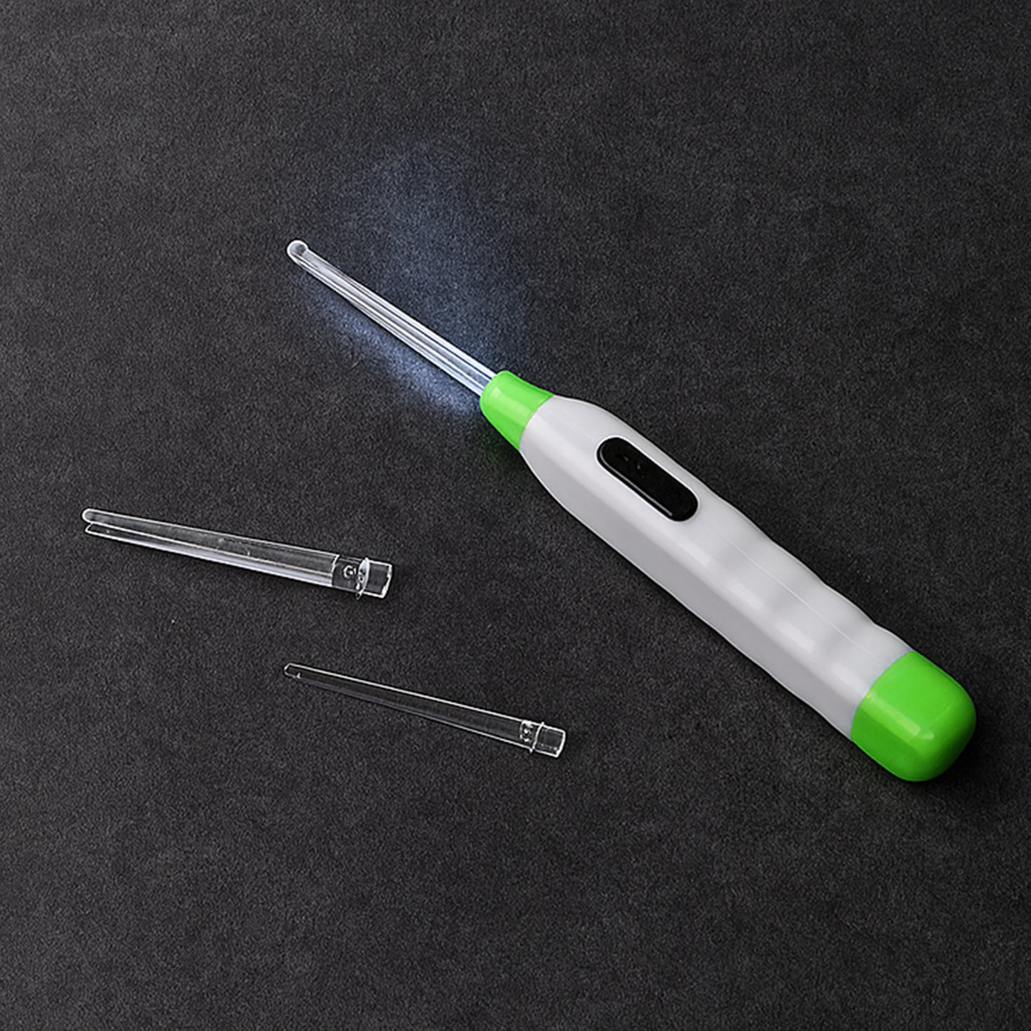 Wukusy 5-in-1 LED flashlight ear pick with interchangeable transparent ear wax removal heads and built-in light for safe cleaning.
