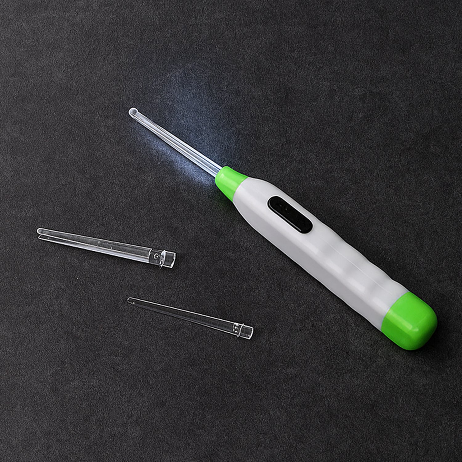 Wukusy 5-in-1 LED flashlight ear pick with interchangeable transparent ear wax removal heads and built-in light for safe cleaning.