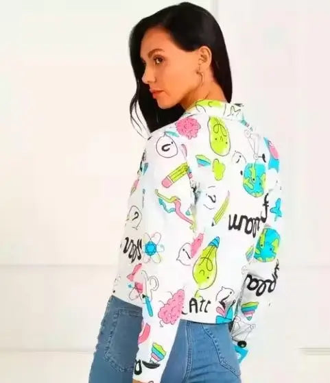 Women’s printed denim jacket by Ekom featuring casual style, colorful patterns, and classic denim design with front pockets.