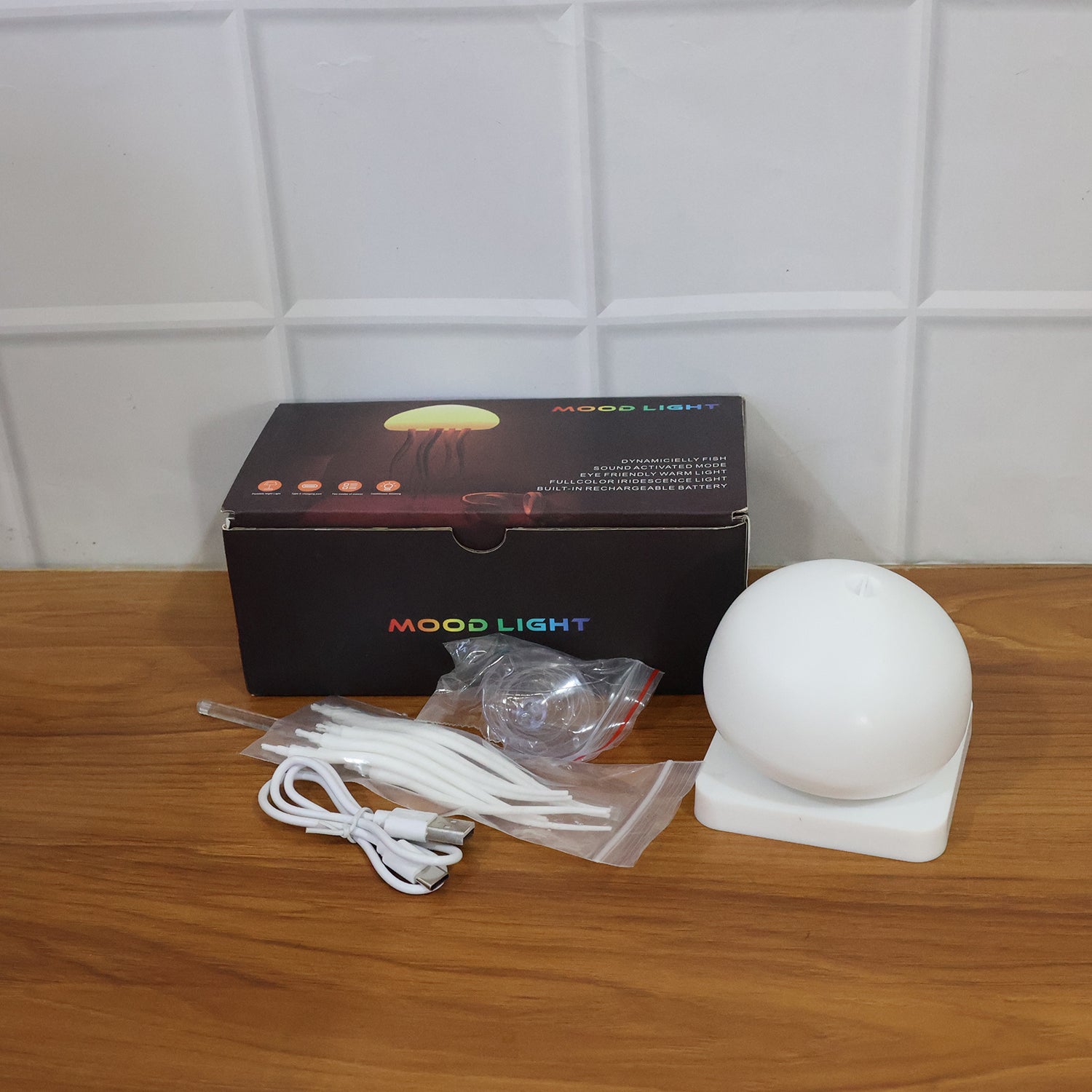 Wukusy jellyfish-shaped LED mood light lamp illuminated in soft blue, showcasing a realistic jellyfish design on a clear background.