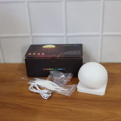 Wukusy jellyfish-shaped LED mood light lamp illuminated in soft blue, showcasing a realistic jellyfish design on a clear background.