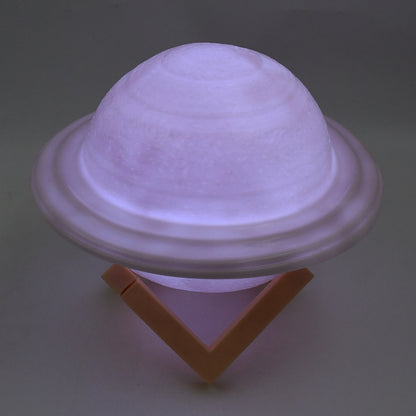 Wukusy 3D Saturn lamp home decor night light with multicolor LED, featuring a base for bedside or room decoration.