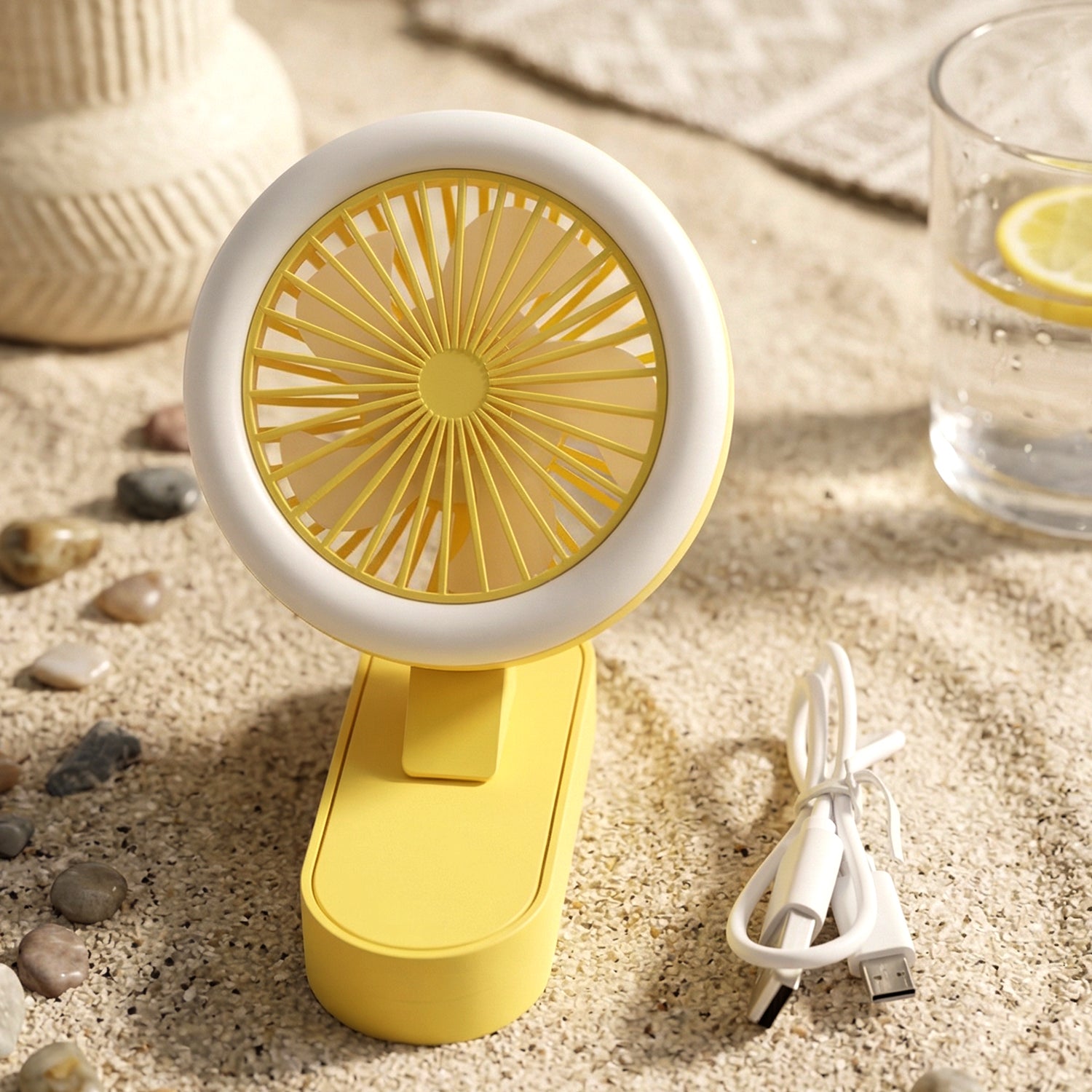 Wukusy portable rechargeable mini table fan with LED light, compact design, showing the fan with blades and illuminated LED panel.