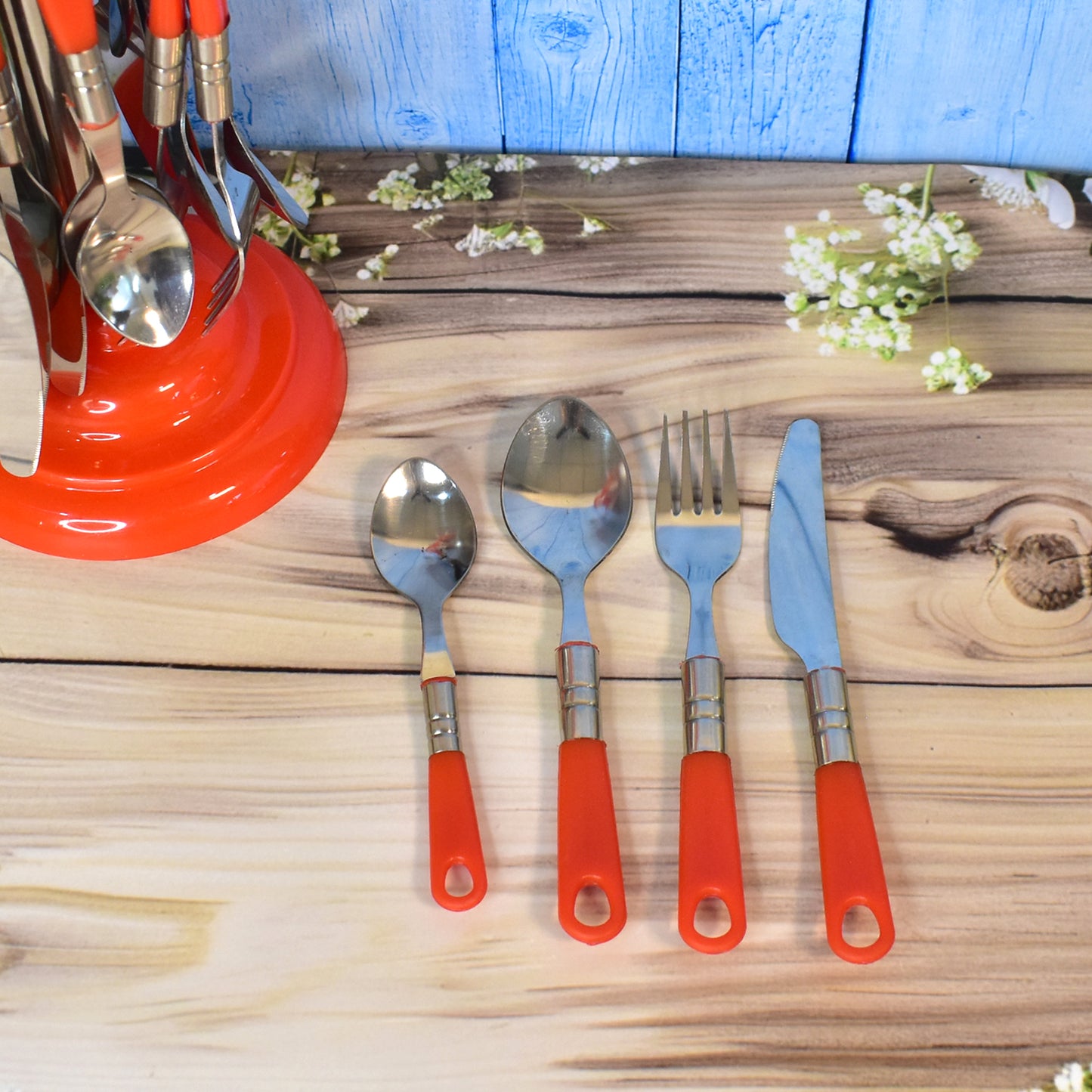 Wukusy 26-piece stainless steel luxury cutlery set with stand for elegant dining table, including forks, knives, spoons, and serving utensils.