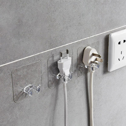 Wukusy 4861 transparent multi-function wall storage hooks mounted on a wall for home organization and storage.
