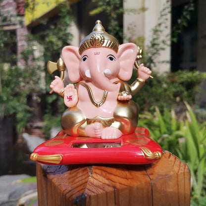 Solar-powered Dancing Ganesha idol decorative showpiece by Wukusy, featuring a moving Lord Ganpati figure for home decor.
