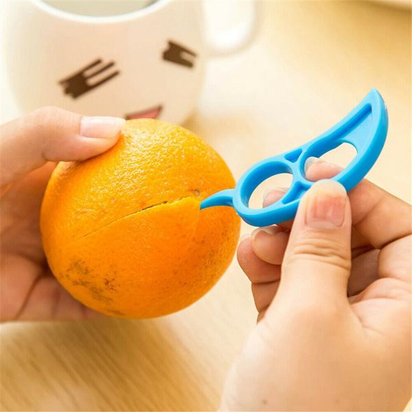 Wukusy Snail Barker creative ring-shaped orange peeler with innovative design for easy citrus peeling and serving.