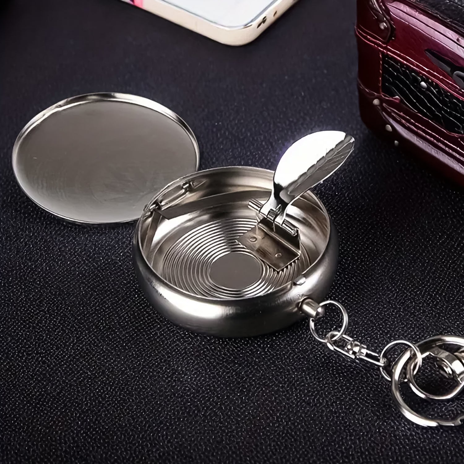 Wukusy mini pocket stainless steel ashtray with keyring, compact design for home or on-the-go use