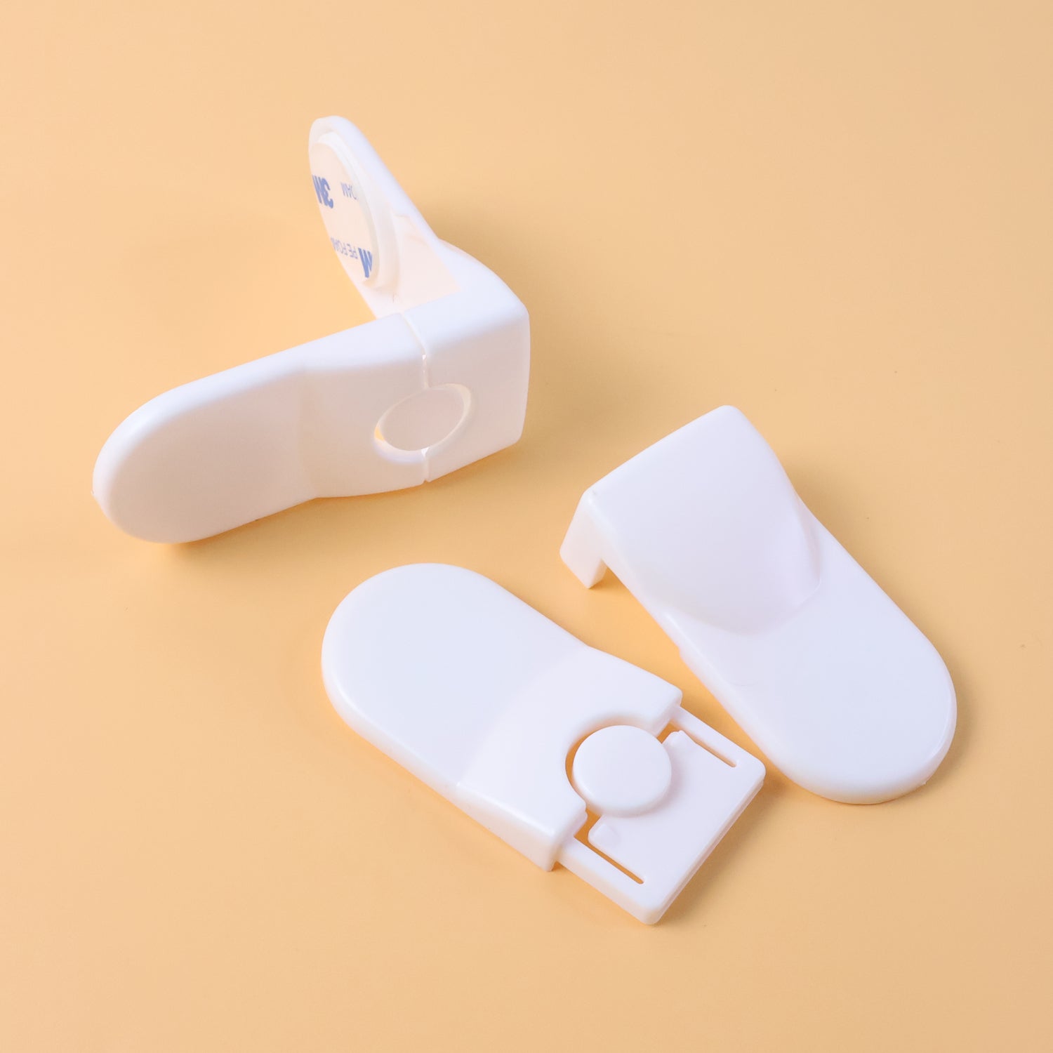 Wukusy Baby Safety Cabinet Lock set with two plastic locks for securing cabinets and drawers to prevent child access.