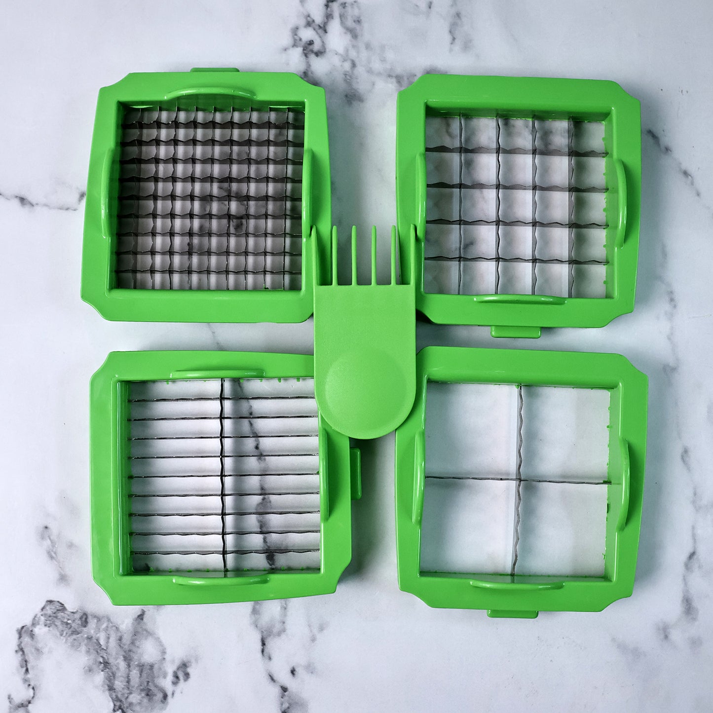 Wukusy Supermom Quick Nicer Dicer vegetable and fruit chopper with multiple blades for easy food prep.