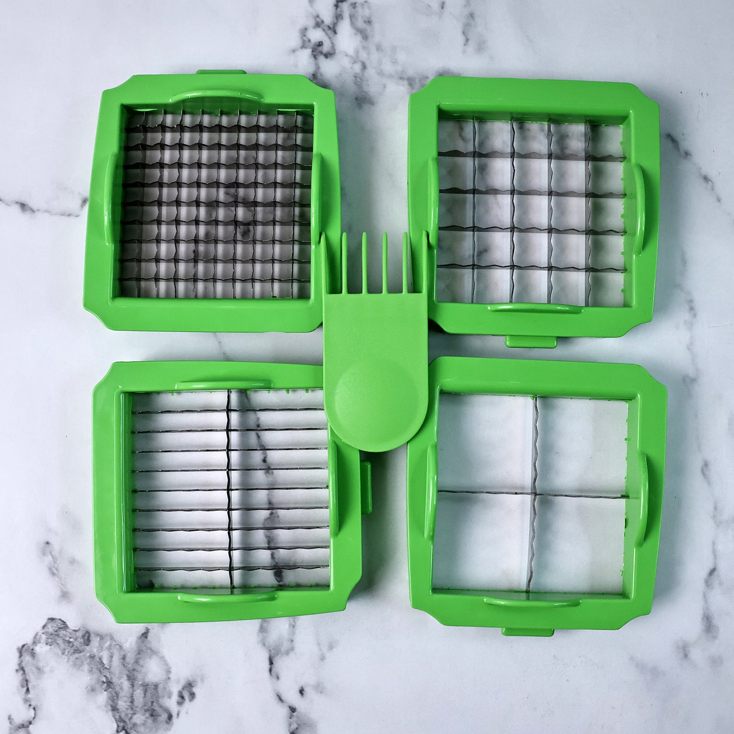 Wukusy Supermom Quick Nicer Dicer vegetable and fruit chopper with multiple blades for easy food prep.
