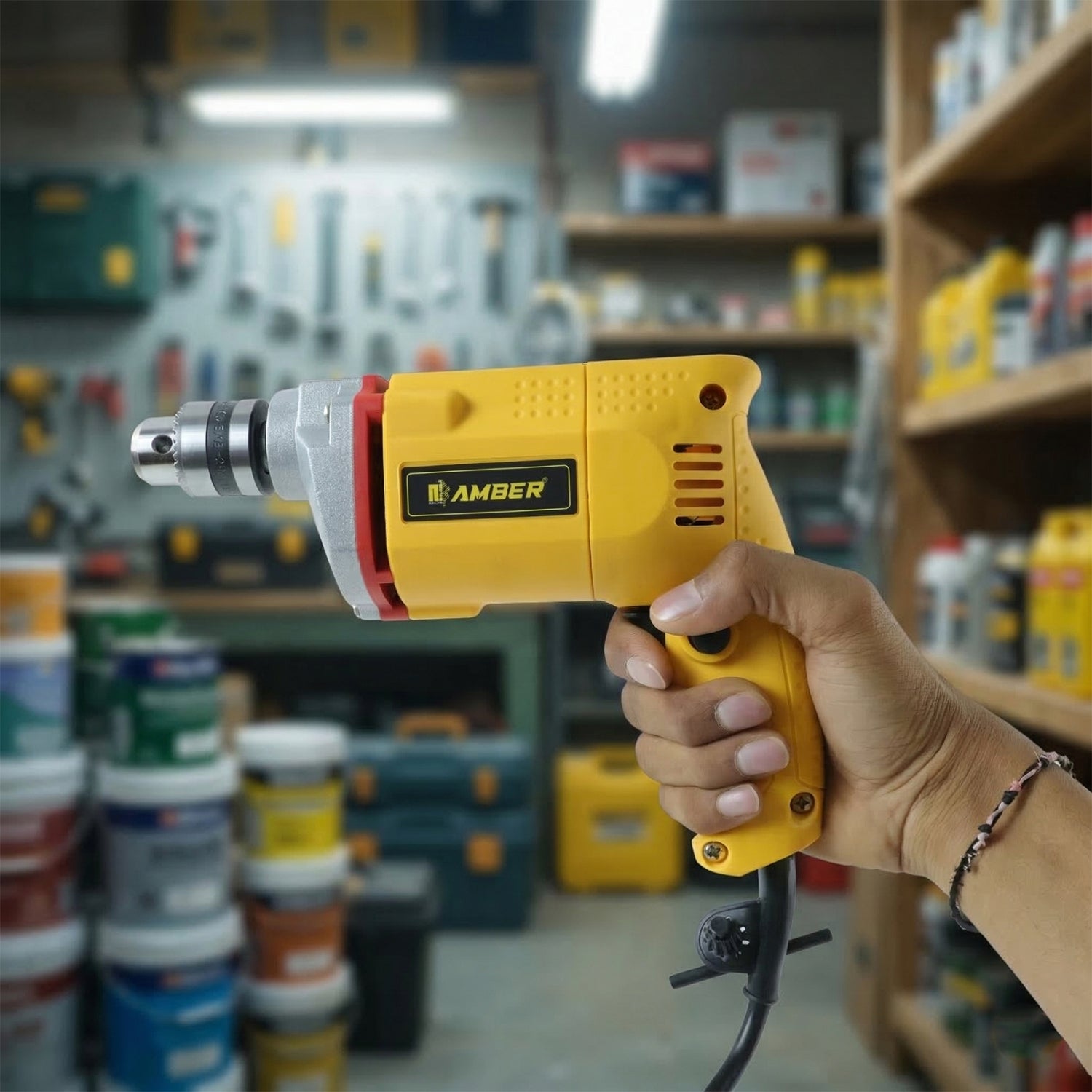 Amber Electric Drill Wukusy AM2310 350W shown with drill bit and power cord on a workbench.