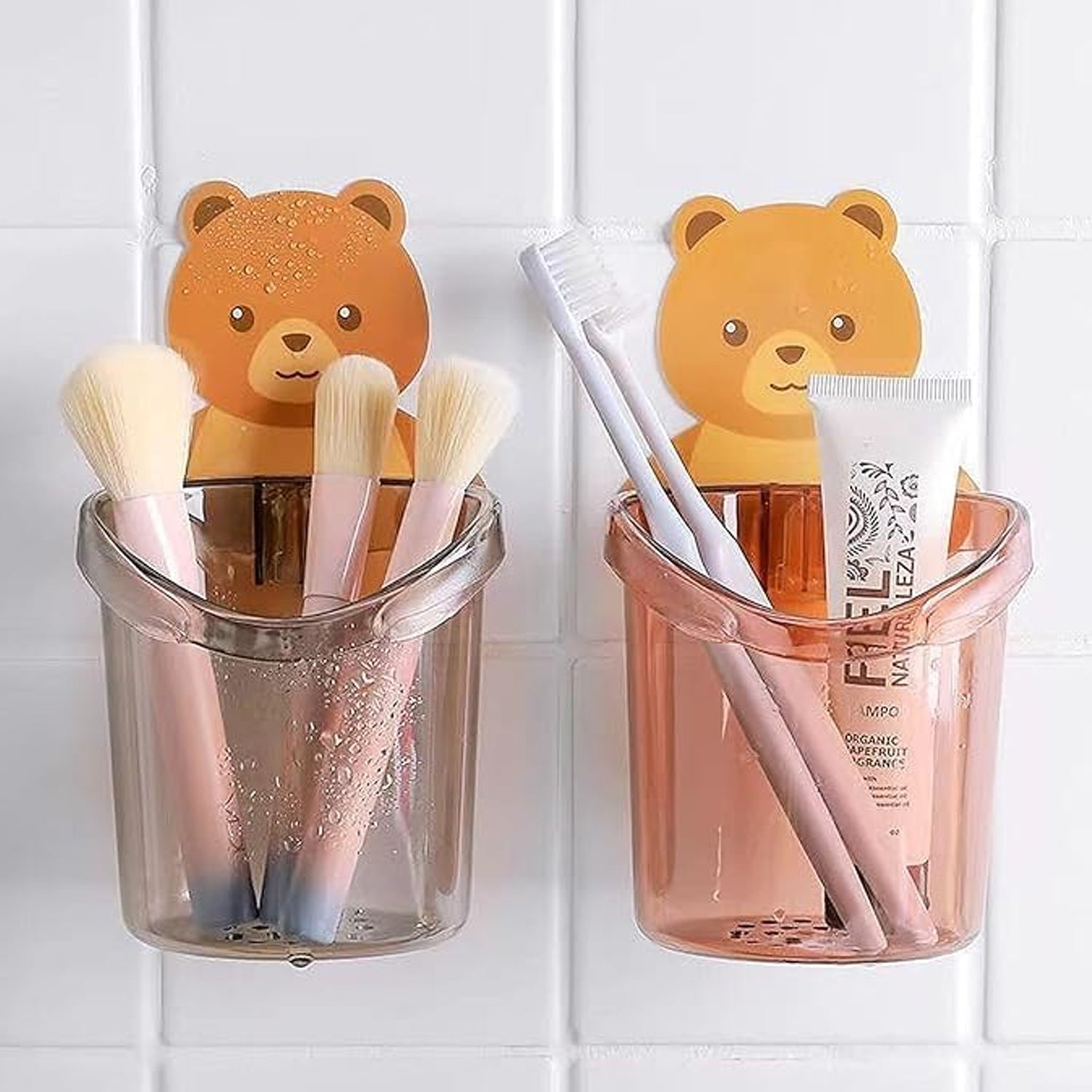 Three Wukusy teddy bear toothbrush holders for kids, colorful and cute, designed for bathroom organization and fun.