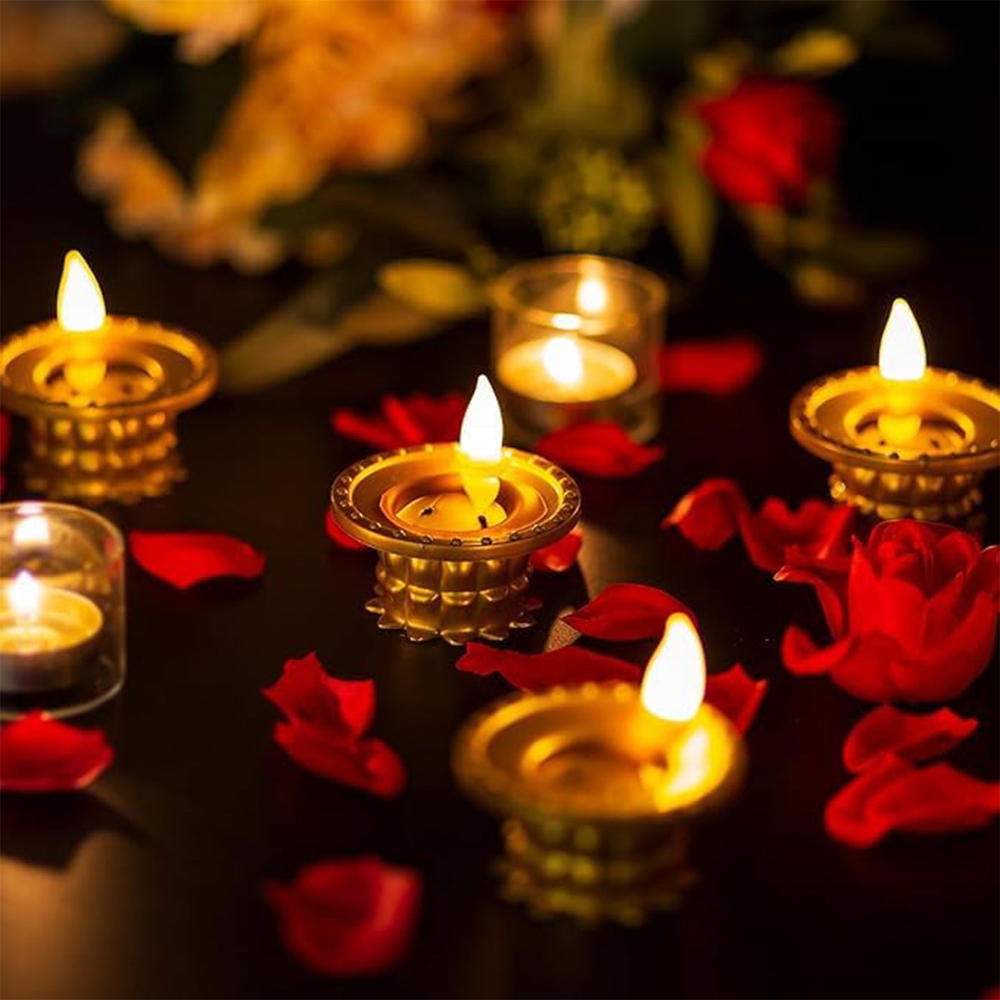Set of 3 water sensor LED golden diyas for home decor, featuring traditional design with glowing LED lights.