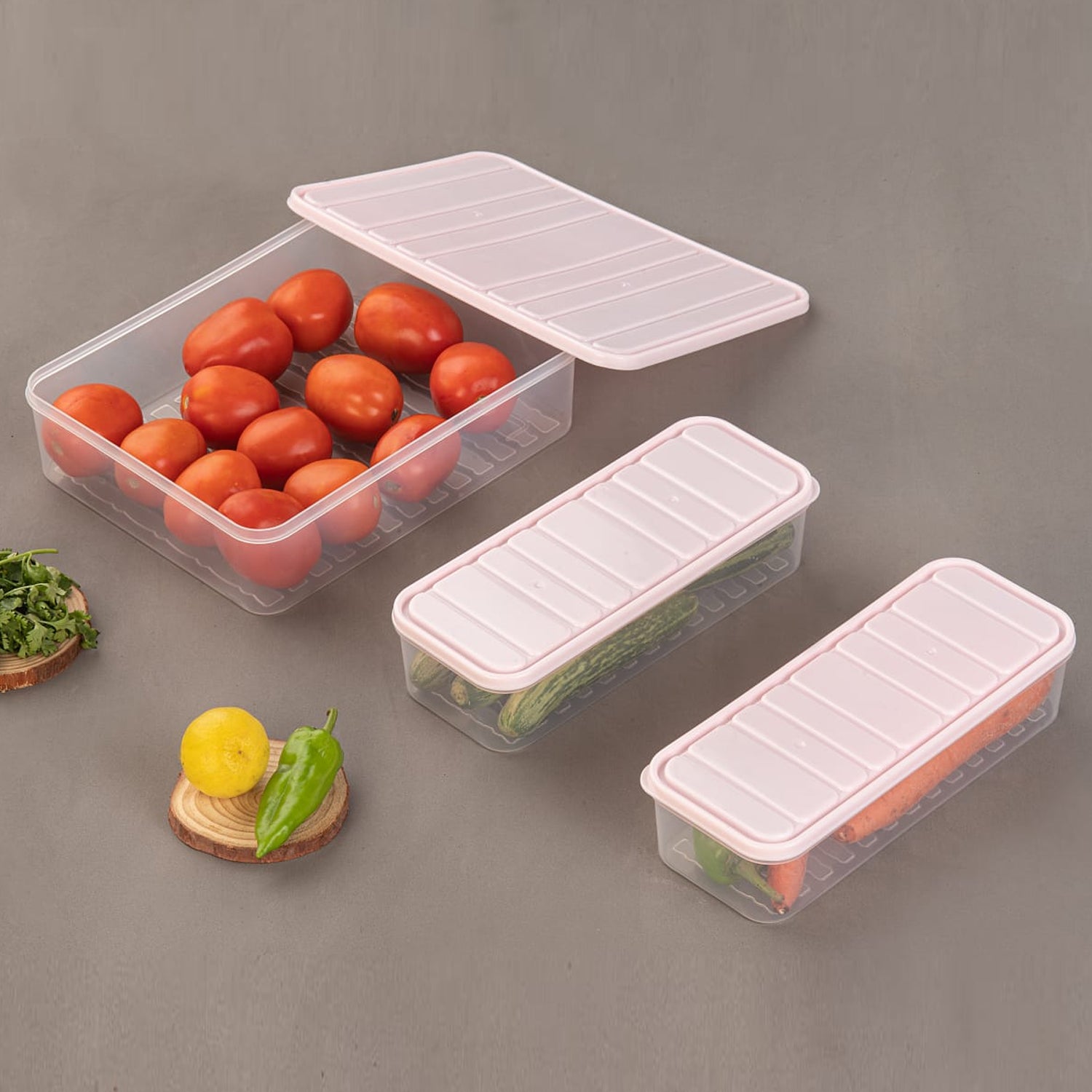 Wukusy 3-pack plastic food storage containers with lids, stackable fridge organizers for vegetables, frozen items, and kitchen storage.