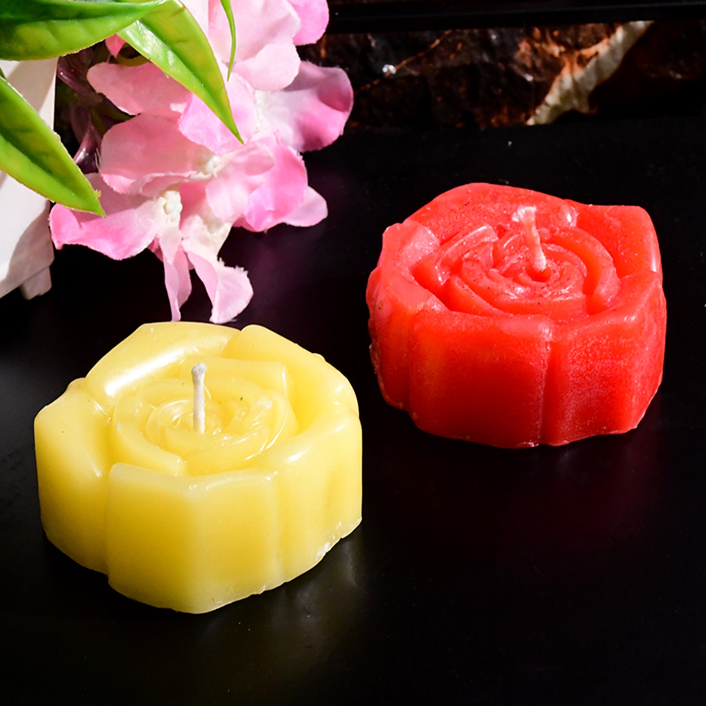 Six rose-shaped wax candles in a set by Wukusy, perfect for home decor and creating a cozy, floral ambiance.