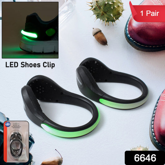 Pair of Wukusy LED shoe clip lights attached to sneakers, glowing in vibrant colors for fun and visibility.