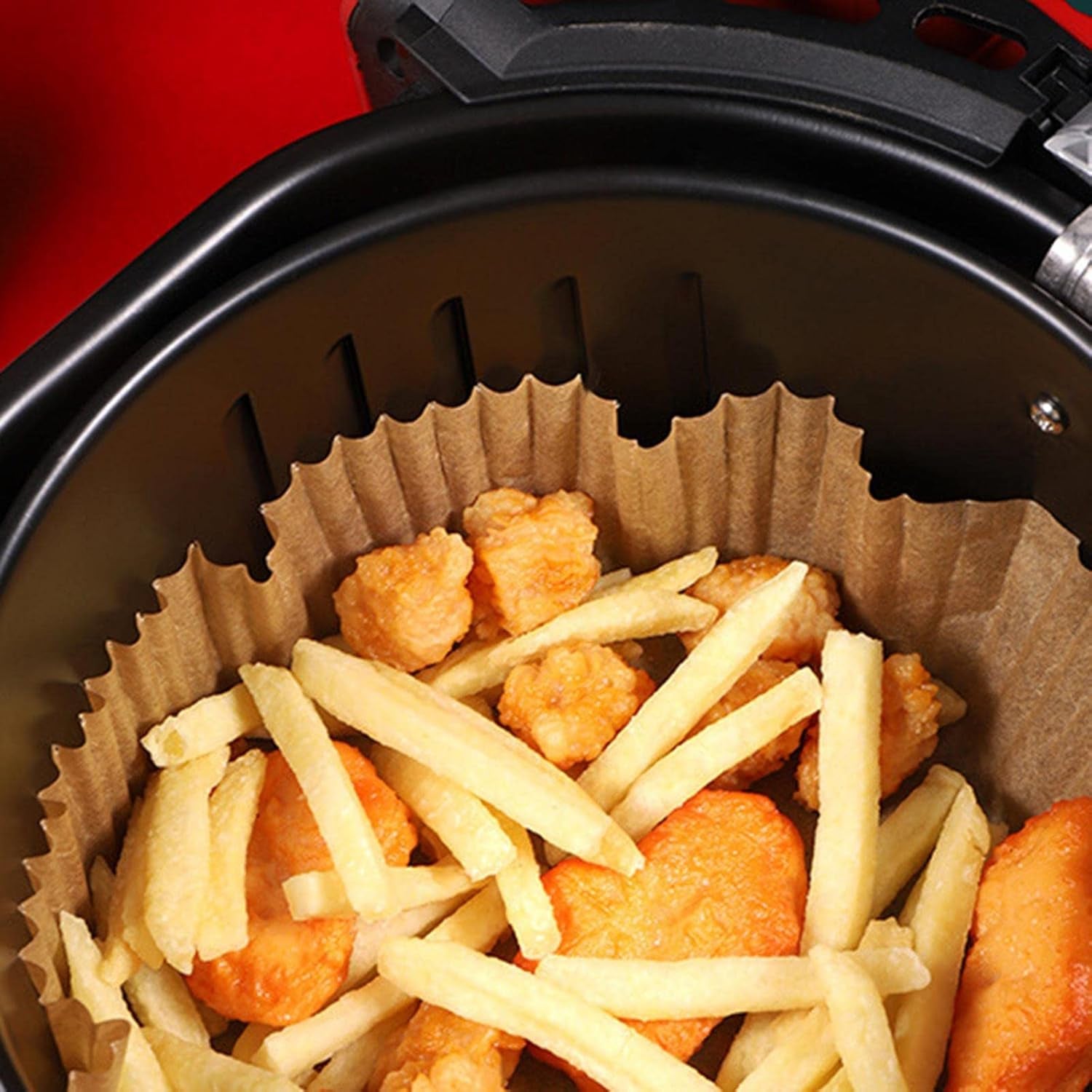 Set of 50 round disposable paper liners for air fryers, 160mm x 45mm, compatible with Wukusy air fryer for easy cleanup.