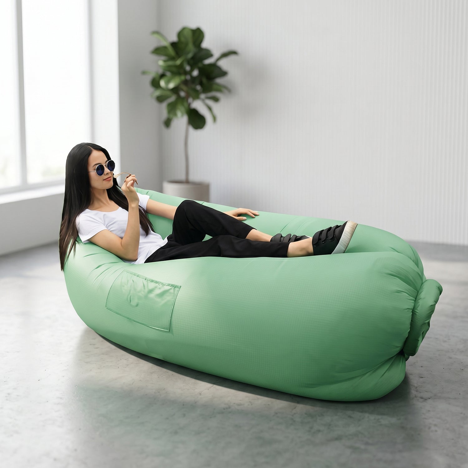 Wukusy foldable inflatable air sofa lounger in open position, lightweight and portable for outdoor relaxation.