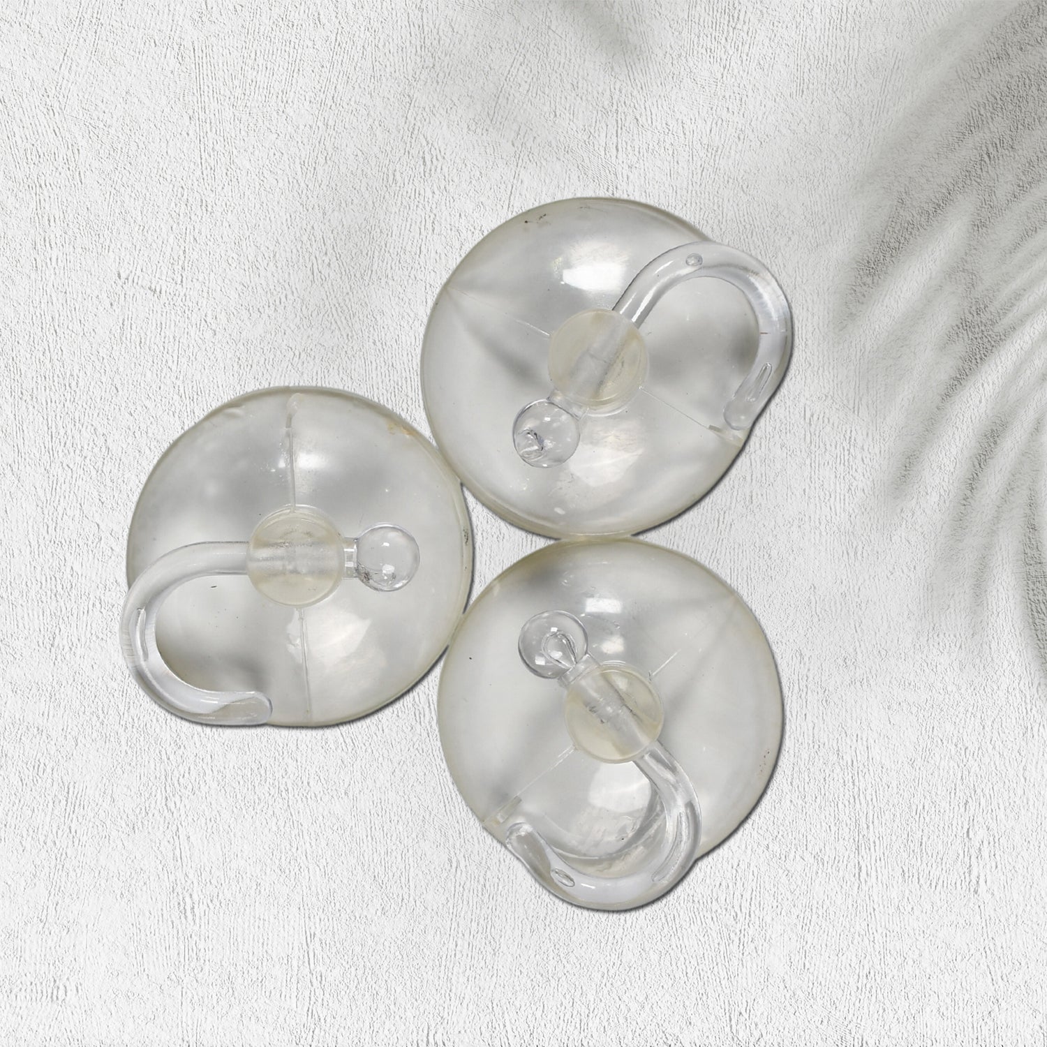 Wukusy transparent rubber vacuum sucker hooks hanging on bathroom wall, strong suction cup for kitchen or window organization.