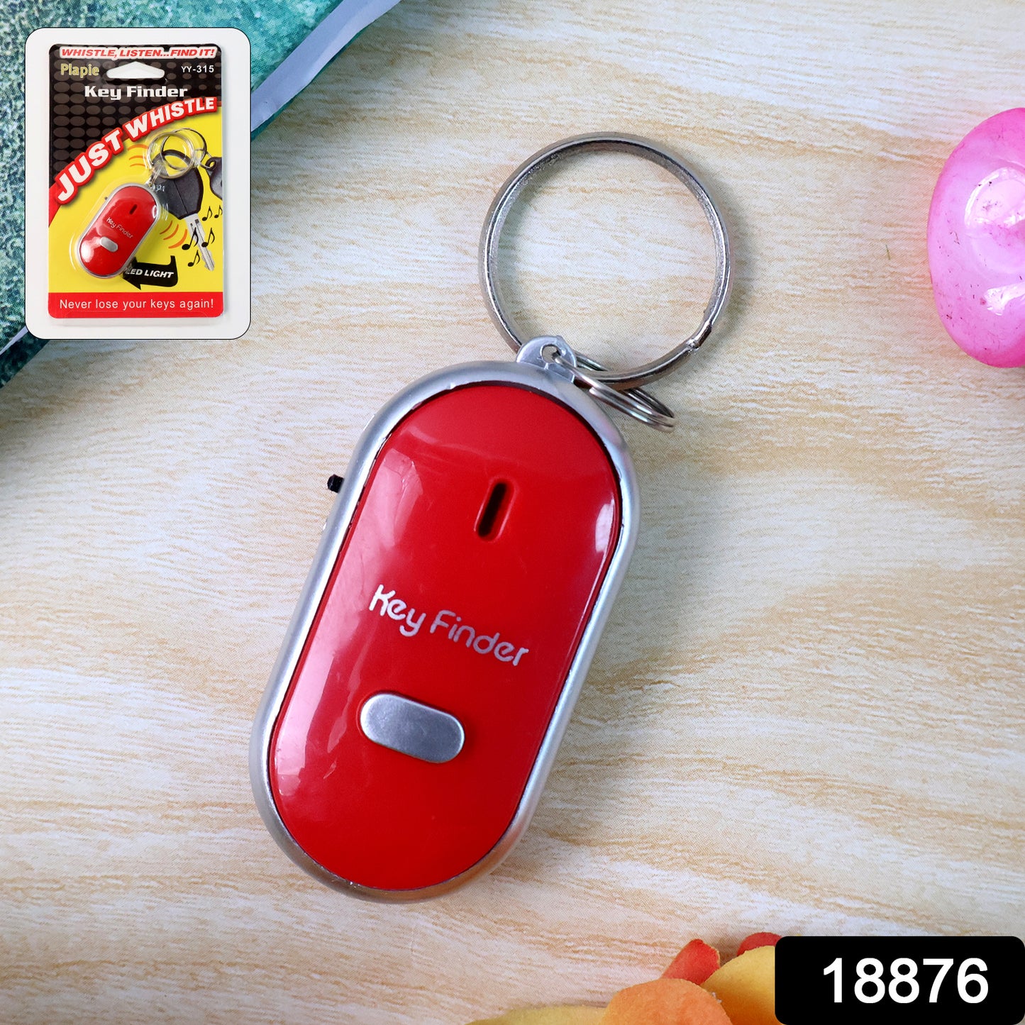 Wukusy key finder anti-lost key chain with whistle and induction feature, shown with attached keys on a white background.
