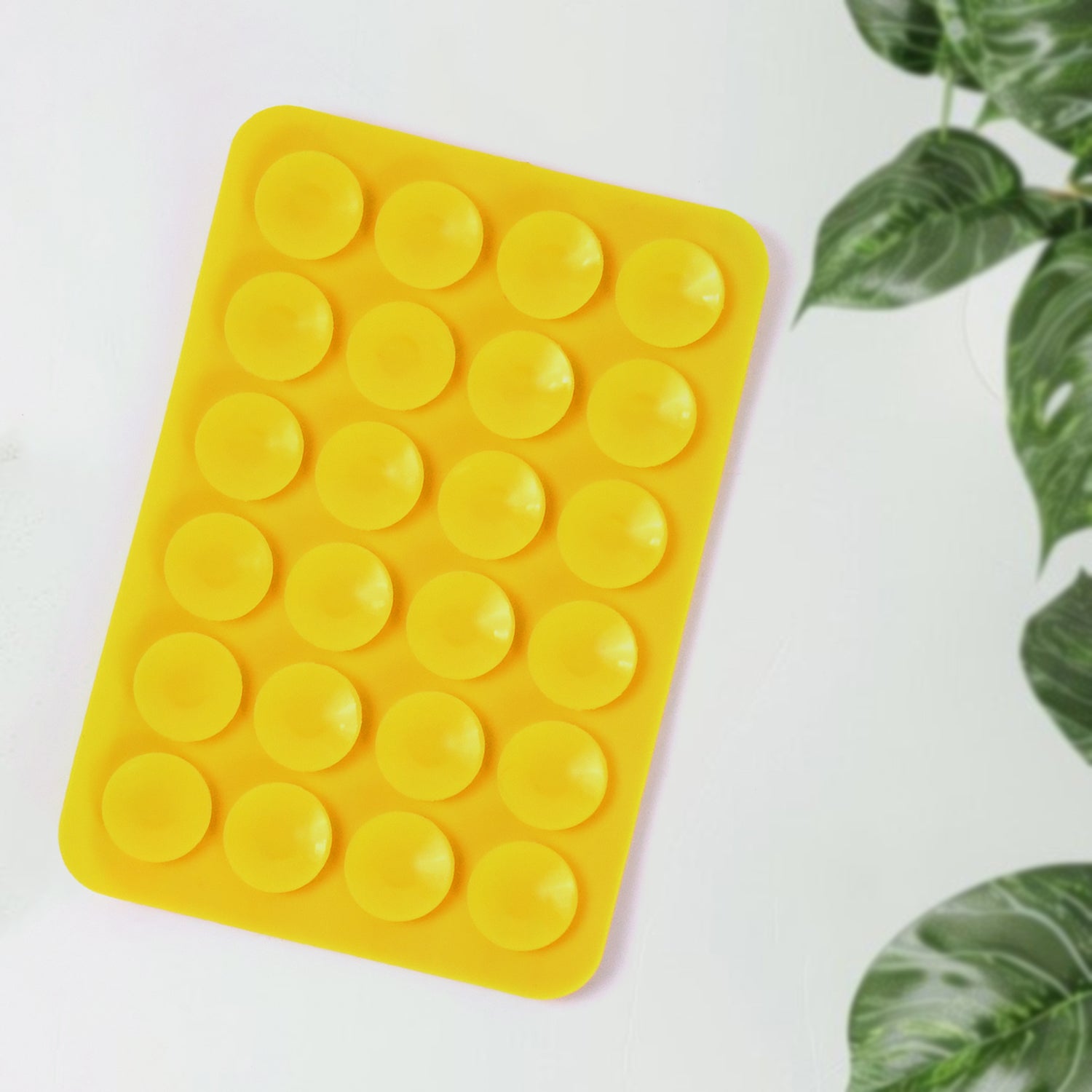 Wukusy suction phone case holder mount in mixed colors attached to a smartphone for secure hands-free use.