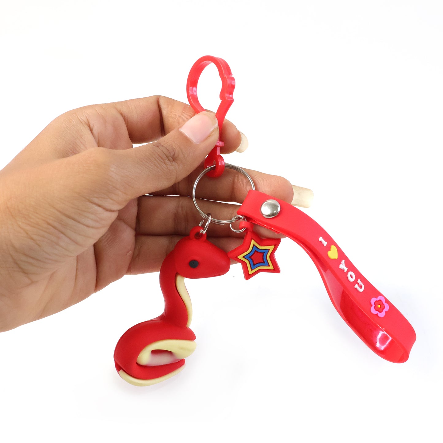Cute snake-shaped keychain by Wukusy with a detailed, colorful snake design on a keyring.