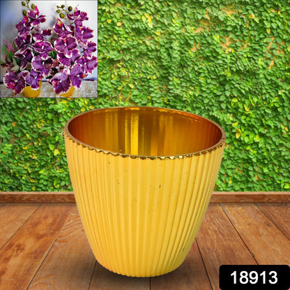 Plastic Flower Valencia pot by Wukusy, suitable for home and outdoor decor, shown in a vibrant, realistic flower display.