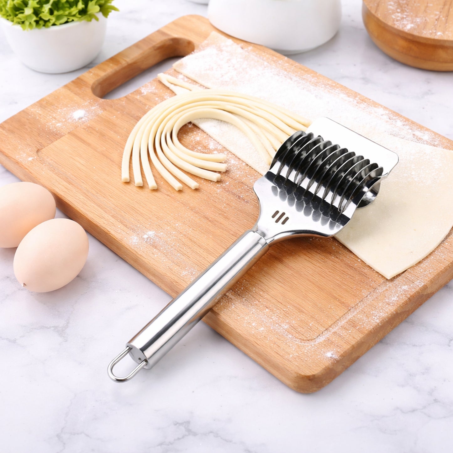 Wukusy stainless steel multi-blade dough cutter with ergonomic handle, designed for precise dough and pastry cutting.