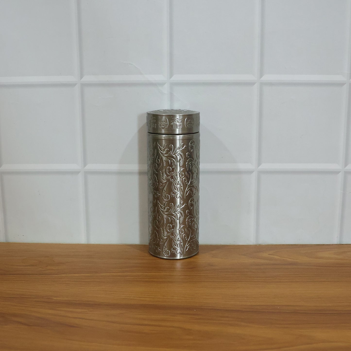 Wukusy premium stainless steel thermal water bottle, 300ml, with sleek silver finish and screw-top lid for keeping beverages hot or cold