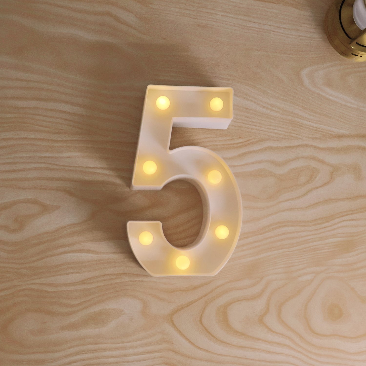 Wukusy Mix Design LED decorative night light for home decor, showcasing a colorful, artistic light fixture on a wooden surface.