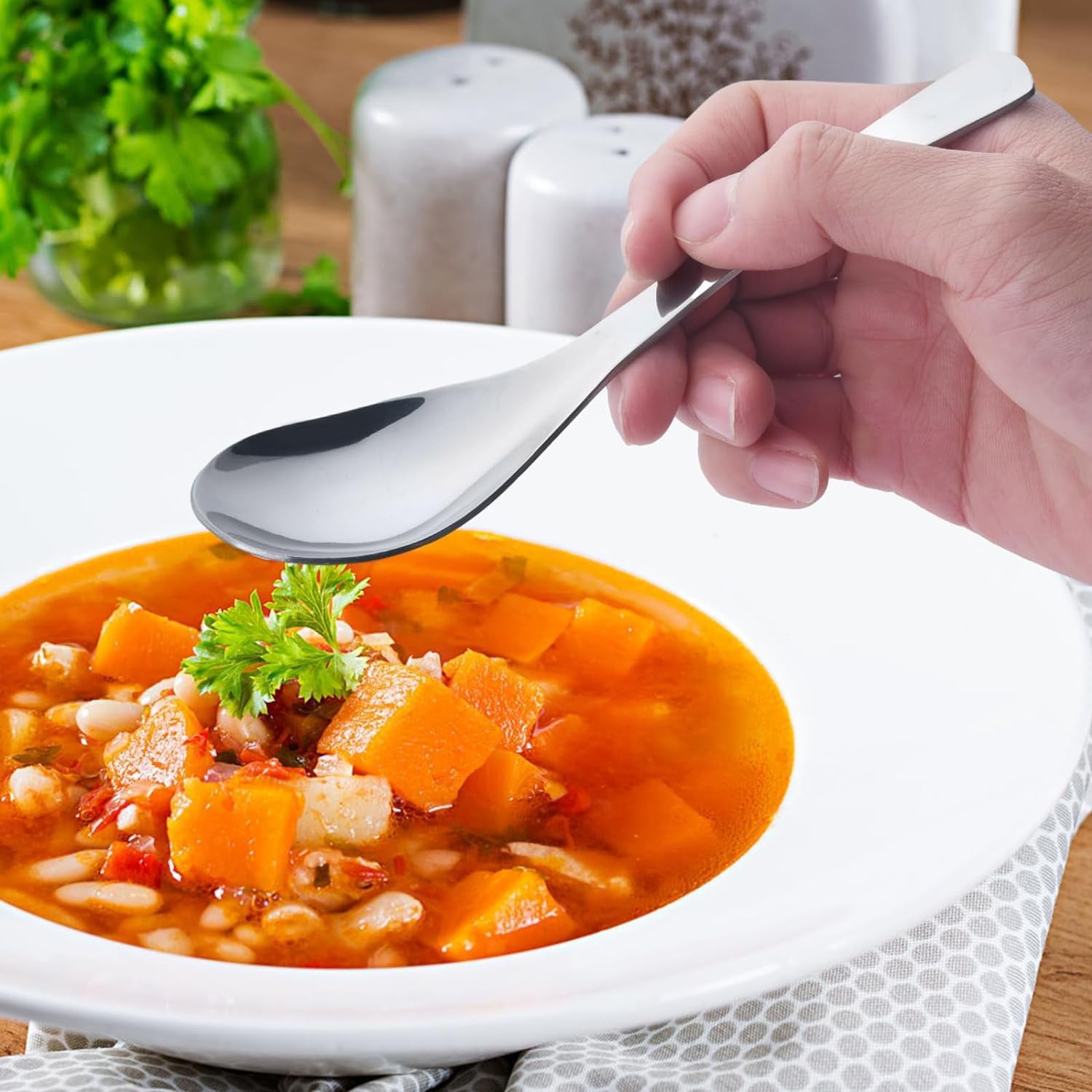 Six Wukusy Apex Premium stainless steel soup spoons displayed together in a set for home and kitchen use.