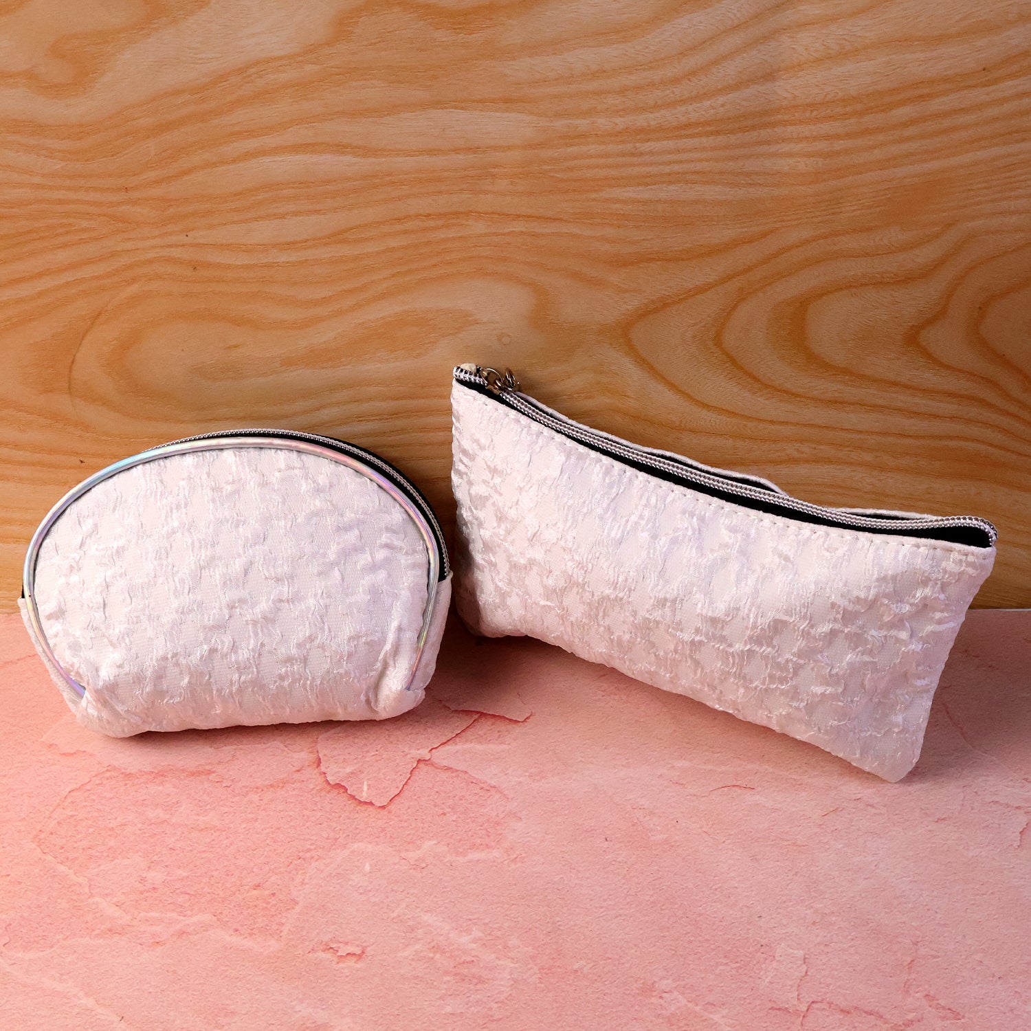 Wukusy 3-in-1 premium travel makeup bag set with multiple compartments and sleek design for organized cosmetics storage.