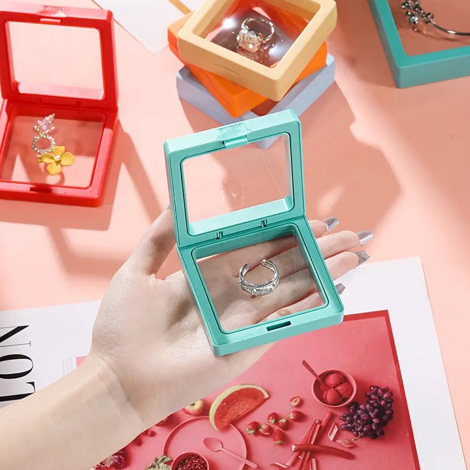 Transparent jewelry display box measuring 7x7 cm by Wukusy, showcasing a sleek, clear case for organizing and presenting jewelry.