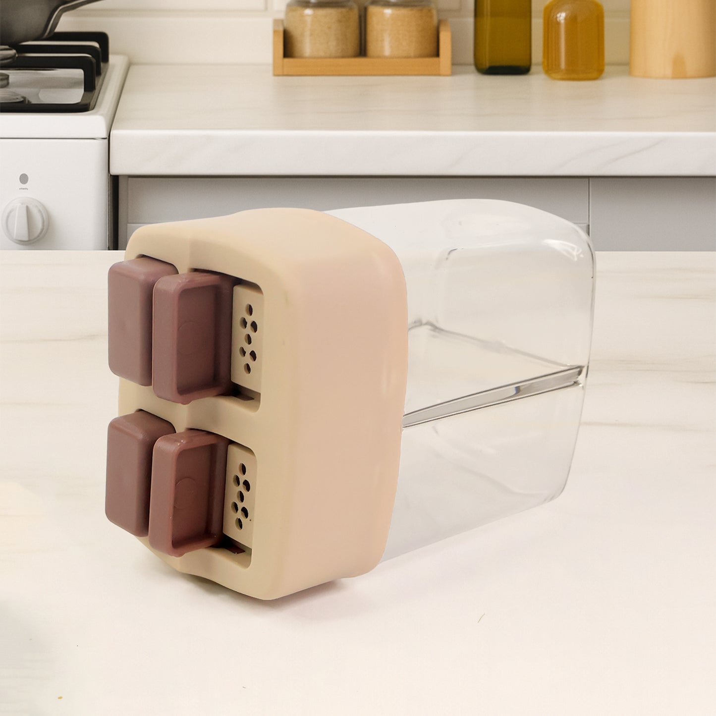 Wukusy Ritu Premium 2-in-1 salt and pepper dispenser with clear container and dual spouts for kitchen seasoning.