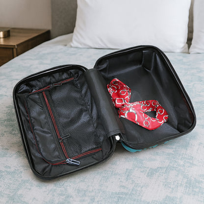 Wukusy 4-in-1 luggage set with durable hard shell suitcases in black, featuring telescoping handles and spinner wheels for easy travel.