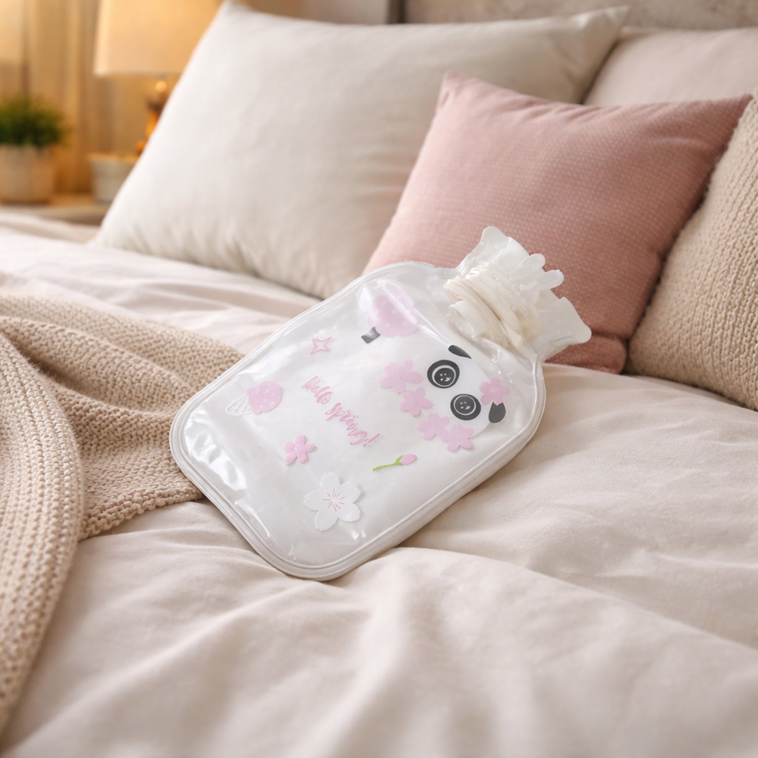 Wukusy cute printed mini hot water bag, 16x11 cm, with colorful floral design, made of soft rubber for soothing warmth.