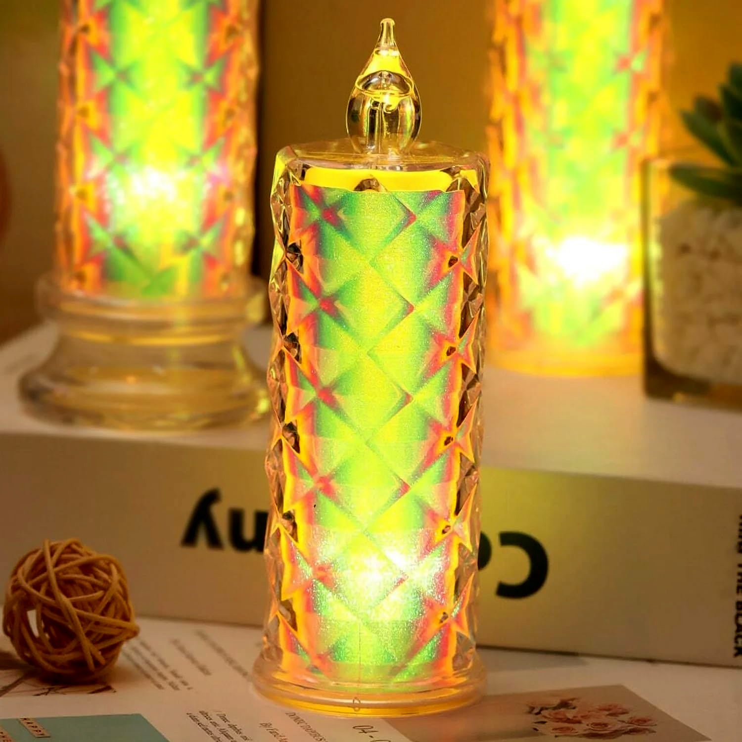 Set of 12 smokeless LED candles by Wukusy for home decor, featuring realistic flickering flame effects on a clean surface.