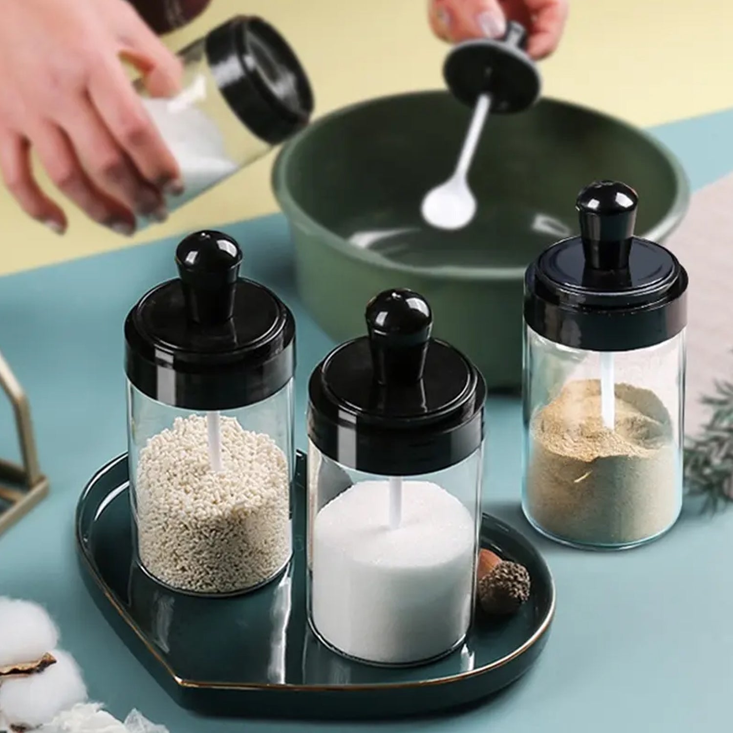 Wukusy glass spice jar from the multipurpose spice box set, used for storing masala and seasonings in the kitchen.