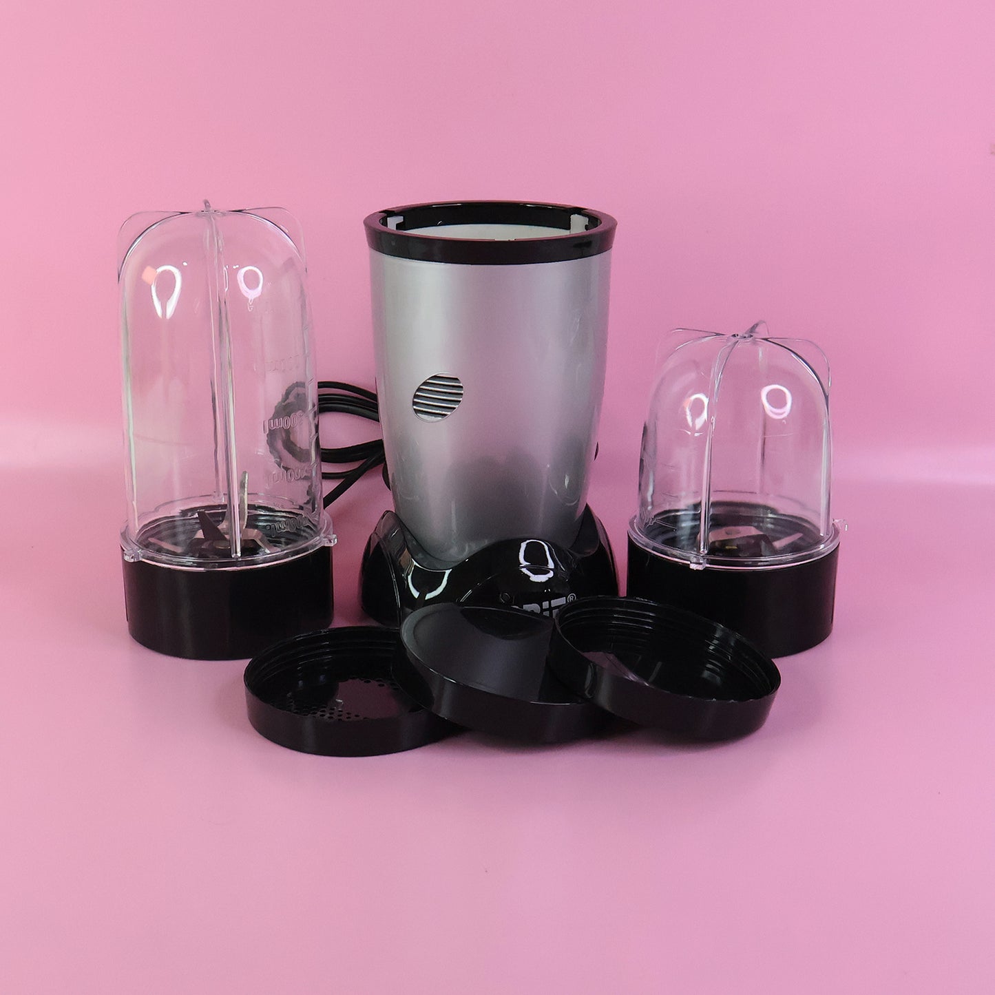 Wukusy Orbit multi-purpose bullet mixer with 400W motor and two jars for blending and mixing in home and kitchen use.