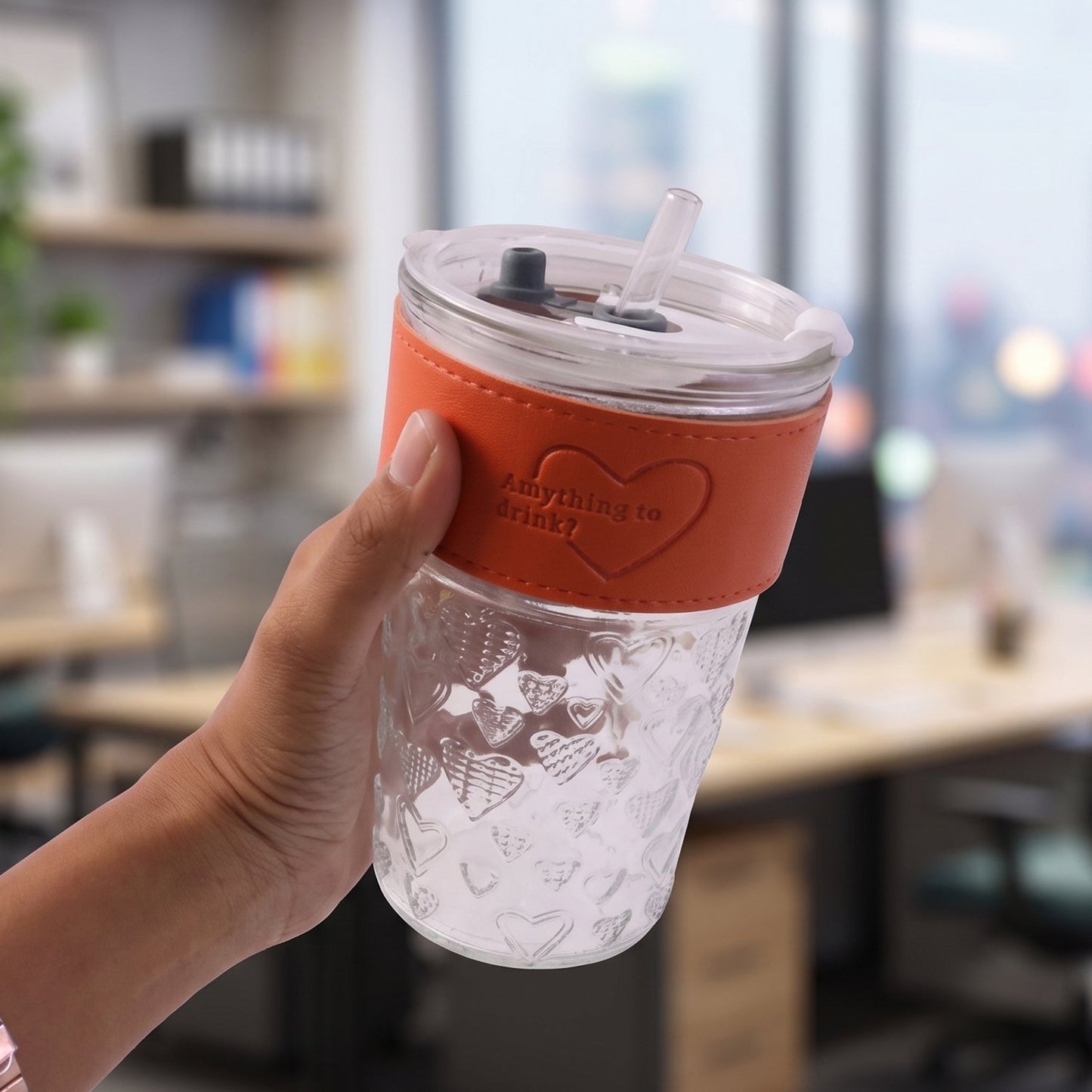 Transparent glass drinking tumbler with lid, ideal for water and juice, by Wukusy, shown with a clear view of the tumbler and lid.