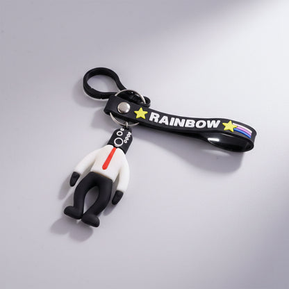 Cartoon man figure keychain from Wukusy featuring a playful, colorful character design on a metal keyring.