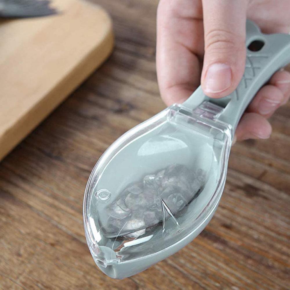 Wukusy Fish Scale Scraper and Peeler kitchen tool with fish scale removal blades and ergonomic handle for seafood prep.