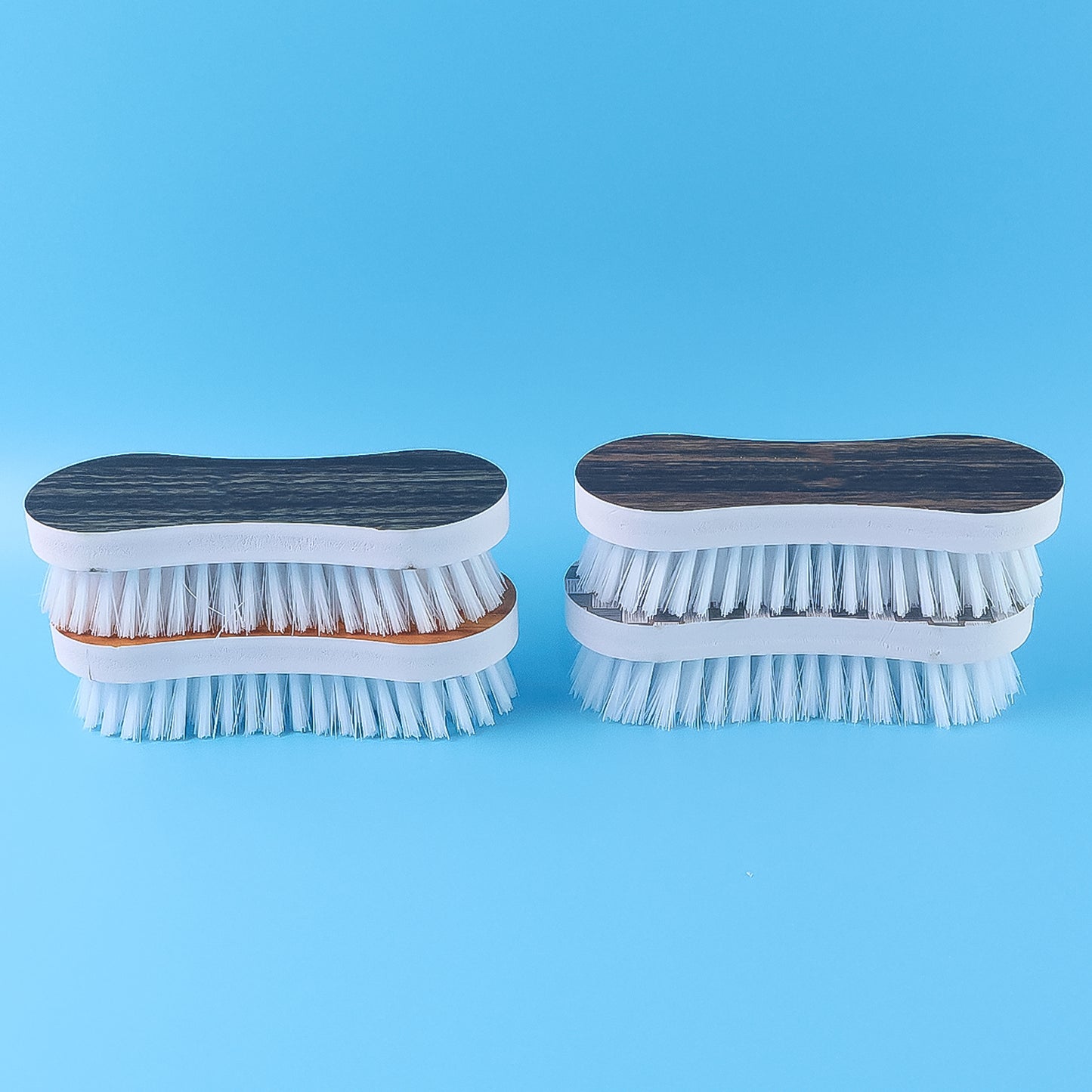 Wukusy ergonomic cloth washing brush set with four durable brushes for effective cleaning of clothes and household surfaces.