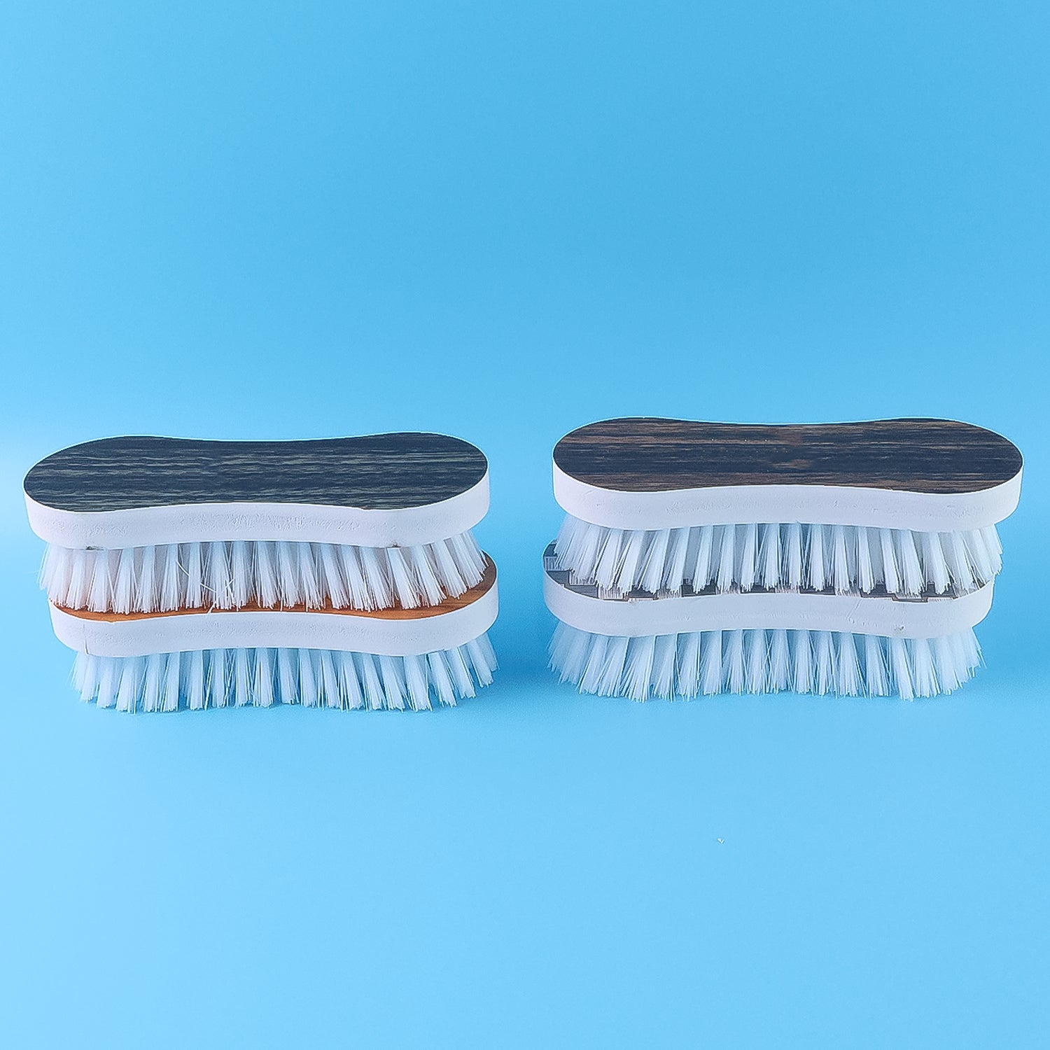 Wukusy ergonomic cloth washing brush set with four durable brushes for effective cleaning of clothes and household surfaces.